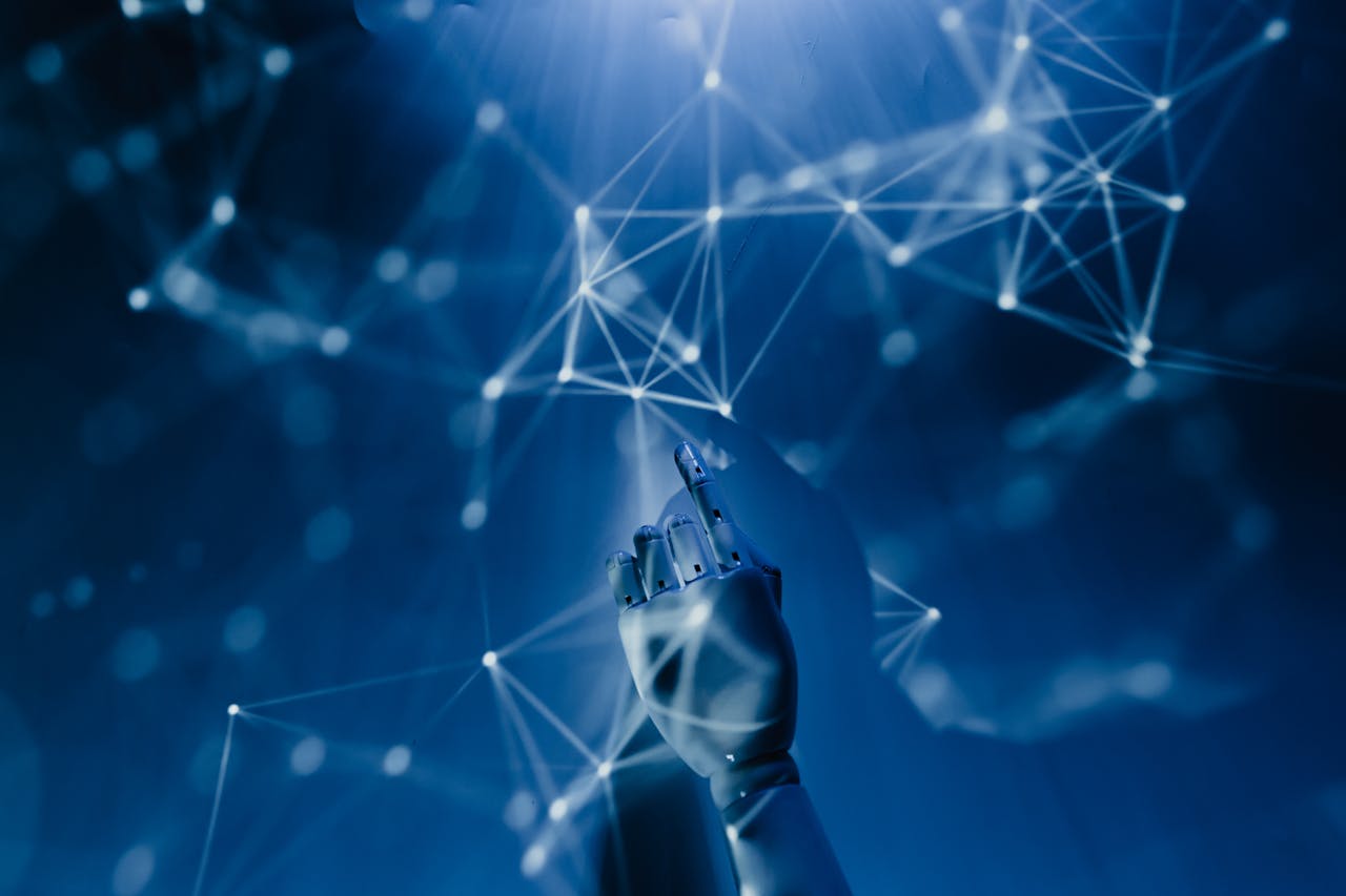 creative A robotic hand reaching into a digital network on a blue background, symbolizing AI technology.